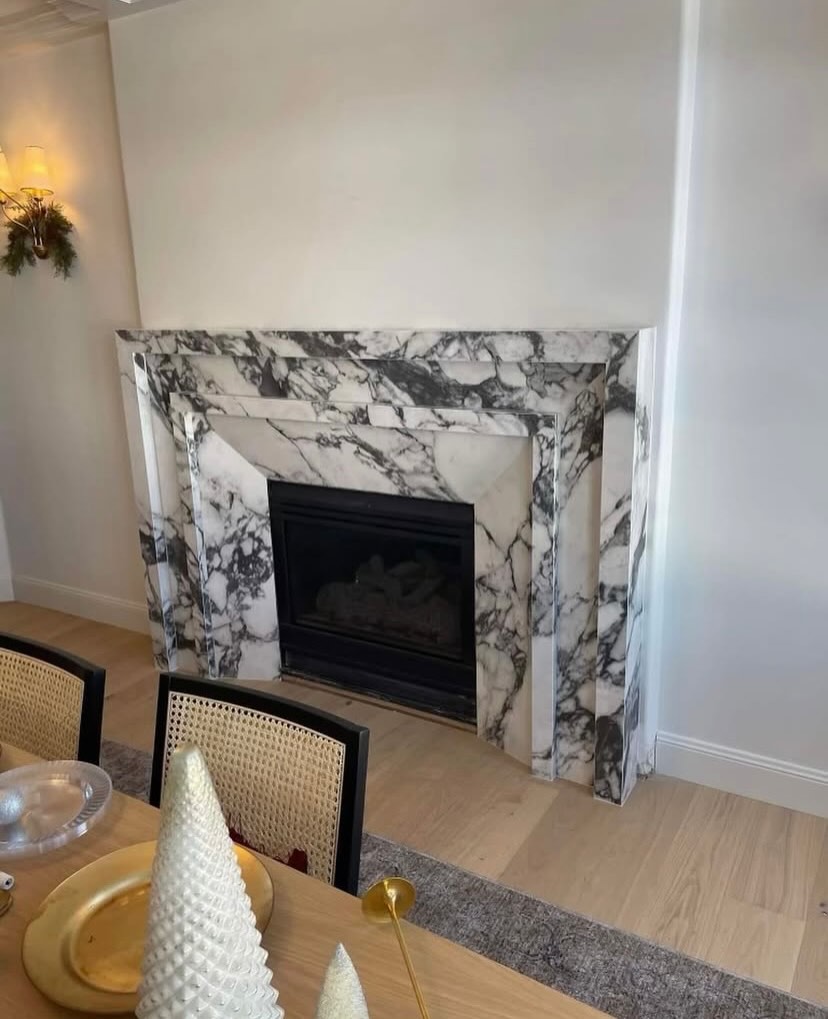 Arabescato Marble Fireplace Surround — Arabescato Marble fireplace project by Indiana Stone Gallery