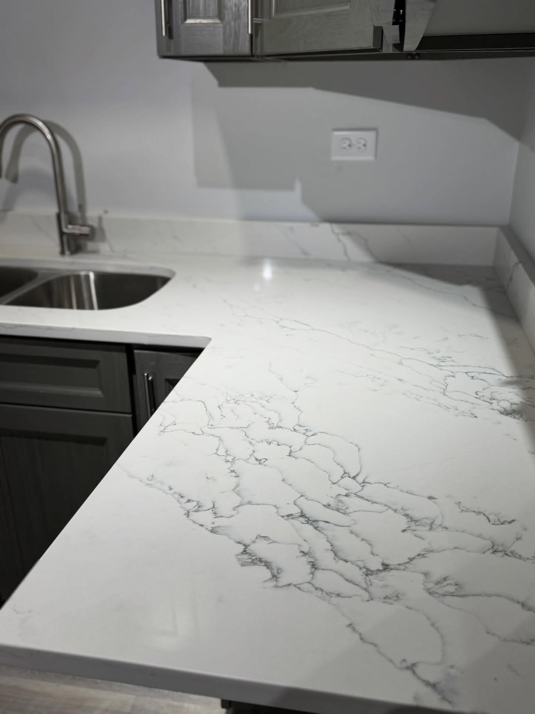 Veined Quartz Countertop & Backsplash — Veined White Quartz kitchen project by Indiana Stone Gallery